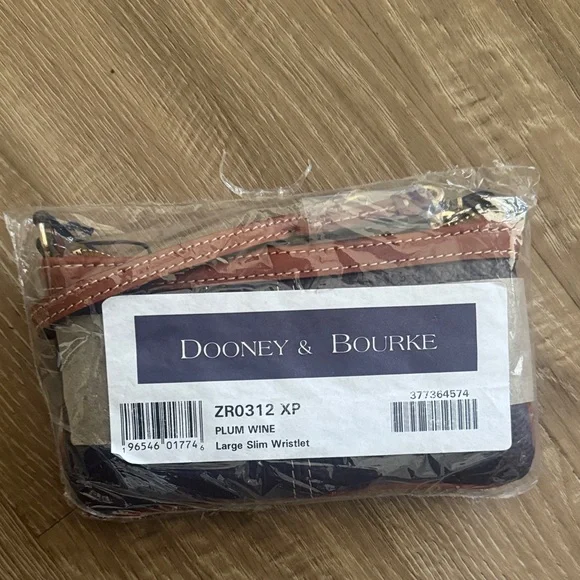 Dooney & Bourke Plum and Brown Women’s Wristlet - Picture 2 of 2